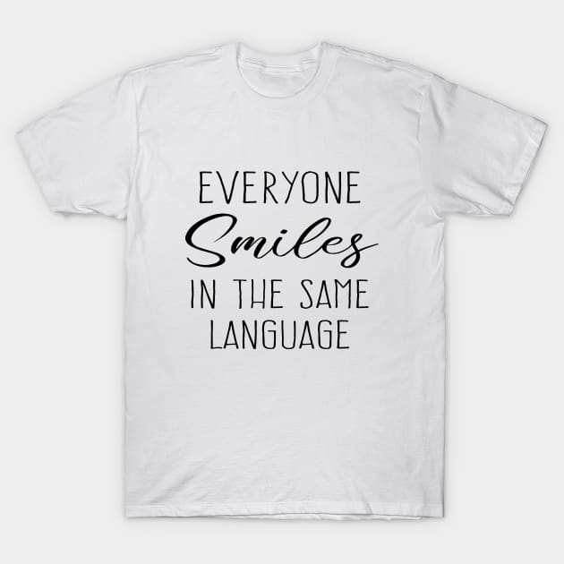 Everyone smiles in the same language T-Shirt by FlyingWhale369